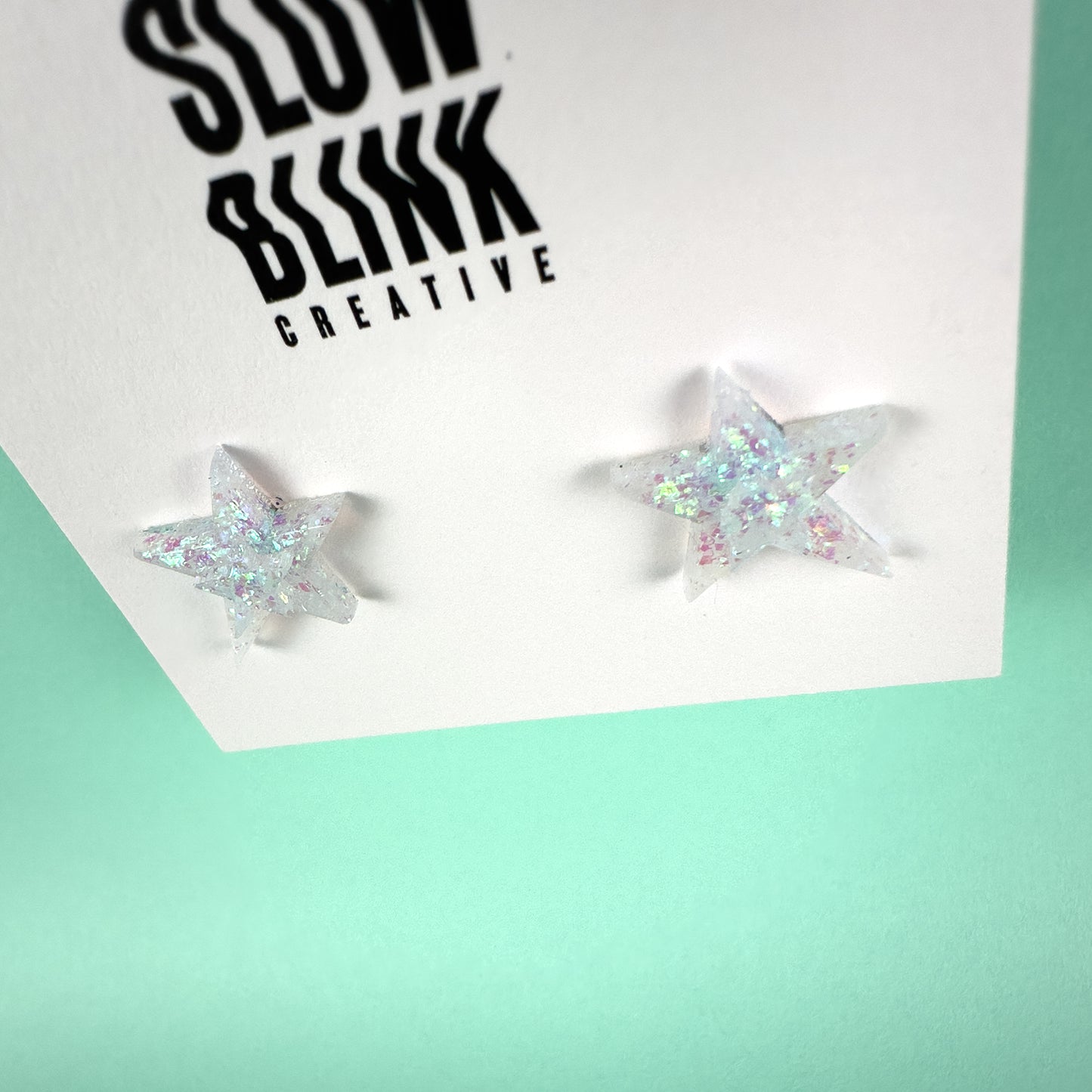 White Iridescent Small Star Earrings